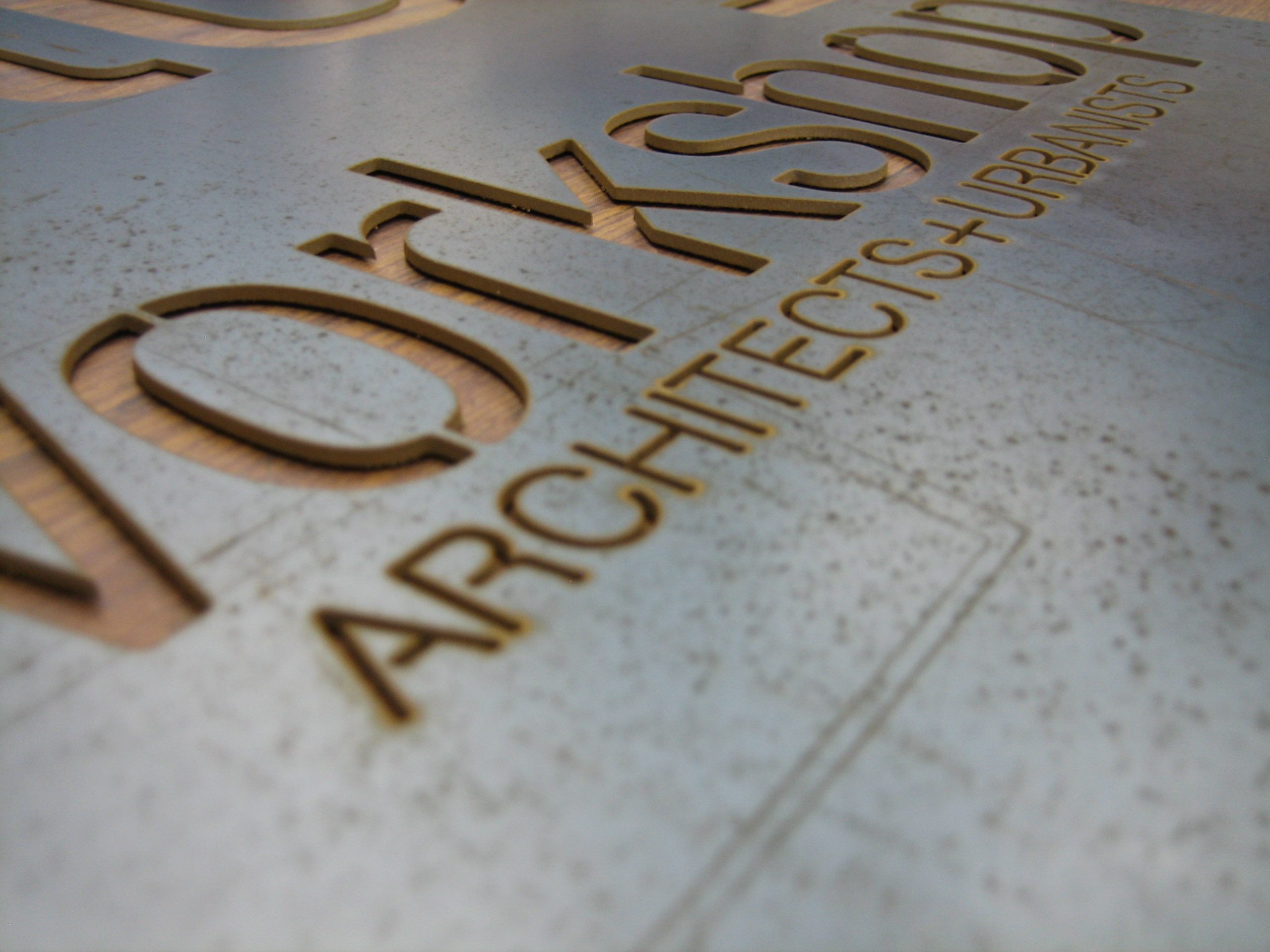 colorado_waterjet_company_signs_sculptures_au_workshop High-Volume Production Jobs – metal tabs