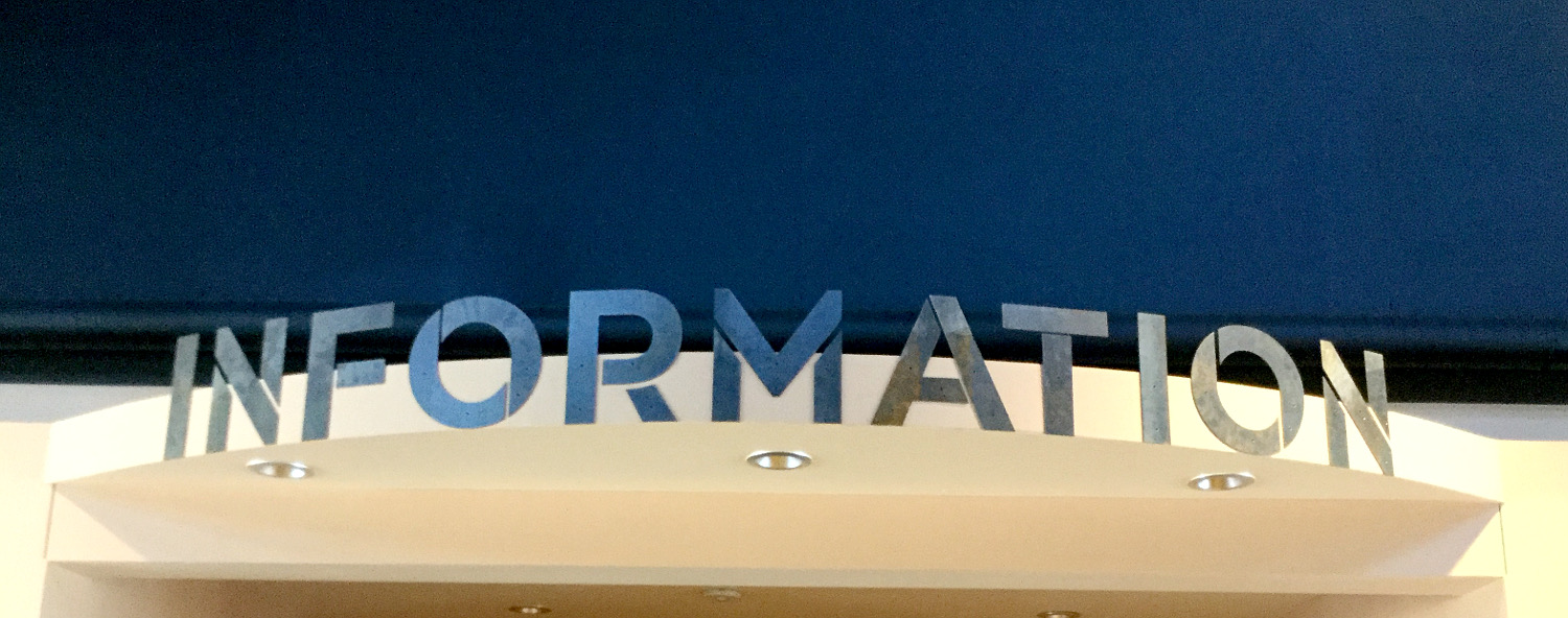 information sign-metal letters around soffit